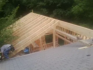 Framing a new roof addition that ties into an existing shingle roof in Succasunna